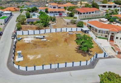 Luchtfoto van het perceel in Spaanse Water op beveiligd resort